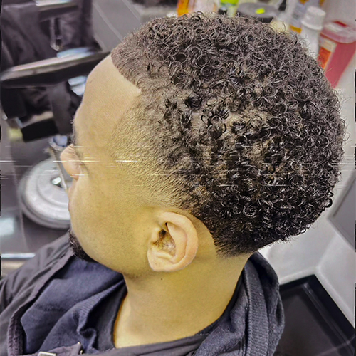 Textured curl fade finished at HQ London